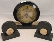 An Art Deco clock garniture