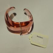 A Baccarat pink glass bangle