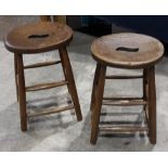 A pair of elm seated stools