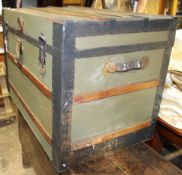 A green painted travelling trunk