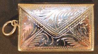 A large silver stamp box