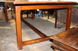 A large plank top refectory table