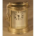 A miniature silver plated carriage clock