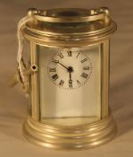 A miniature silver plated carriage clock