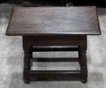 An 18th century style oak joint stool