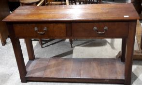A reproduction fruitwood dresser base