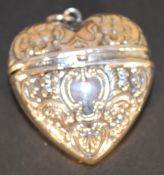 A silver vesta in the shape of a heart