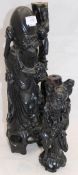 Two Chinese carved hardwood figural carvings