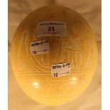 An ostrich egg carved with Egyptian scene