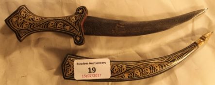 A silver inlaid dagger