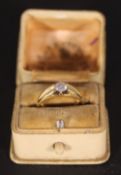 An 18 ct gold solitaire ring
