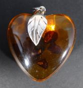 A silver heart pendant