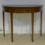 A Georgian demi-lune card table