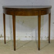 A Georgian demi-lune card table