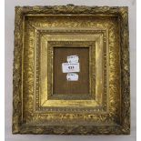 A small gilt wood picture frame