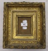 A small gilt wood picture frame