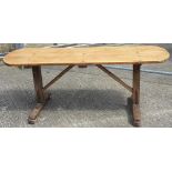 A 19th century pine and oak tavern table