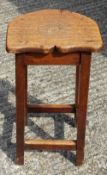 A 19th century oak stool