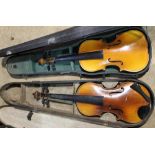 A vintage violin in a 19th century case and another