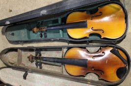 A vintage violin in a 19th century case and another