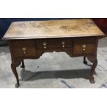 An 18th century chest on stand base (converted to a lowboy)