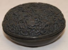 A round lidded box decorated with butterflies