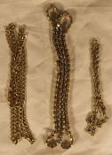 Three silver gilt necklaces