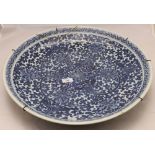 A large 18th century Chinese blue and white charger