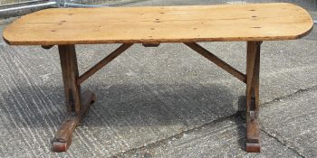 A 19th century pine and oak tavern table