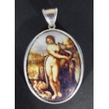 A miniature silver and porcelain pendant depicting Leda and the swan