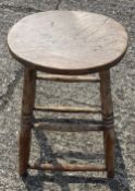 A 19th century elm stool