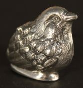 A silver vesta formed as a bird