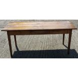 An elm topped farmhouse table