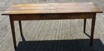 An elm topped farmhouse table