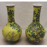 A pair of Chinese yellow ground porcelain vases