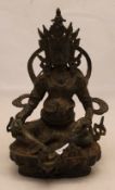 A small bronze model of Buddha