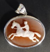 A silver cameo pendant