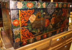 A 19th century Chinese painted leather bound trunk