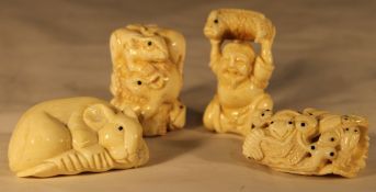 Four bone netsuke,