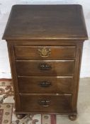 A set of modern oak bedside drawers