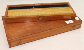 A mahogany cased set of box wood rules and another mahogany case containing rules