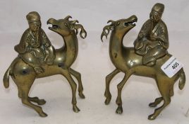 A pair of Chinese brass incense burners,
