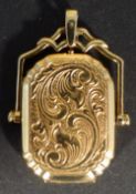A 9 ct yellow gold spinning photo locket pendant