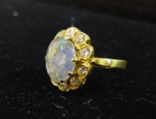 A 14 ct gold and opal ring