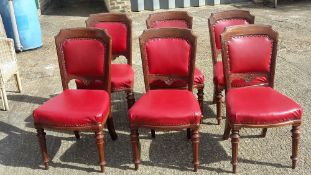 A set of six Victorian upholstered dining chairs