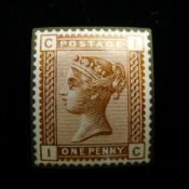 An enamelled postage stamp