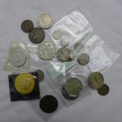 A bag of silver coins etc