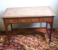 An Edwardian mahogany writing table