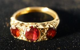 A 9 ct gold garnet ring