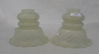 A pair of Vaseline glass shades